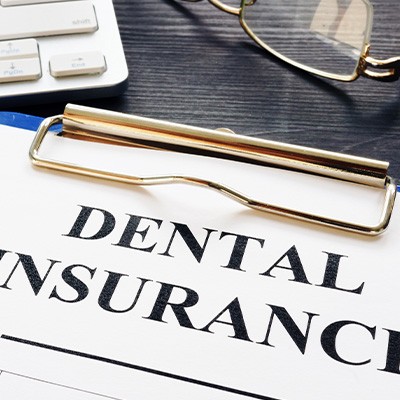 dental insurance form on table